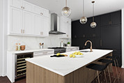 Calacatta Kitchen with Quartz Countertop and Backsplash and Laminate Cabinet Fronts