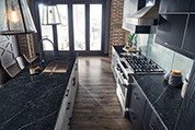 Modern Dark Kitchen with Quartz Countertop