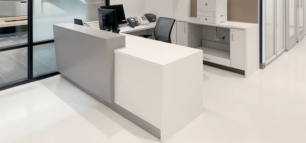 Welcome Desk | Solid Surface in Yukon Riverstone