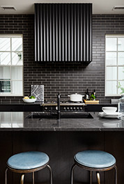 Serenbe House Dark and Dramatic Kitchen with Quartz Countertop